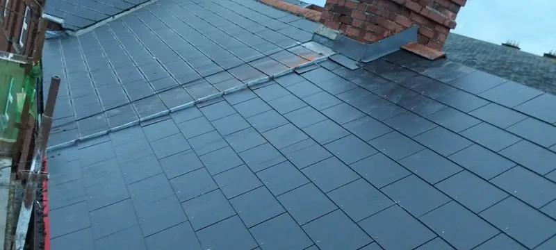 Fresh slate on a terrace roof, Delta Roofing