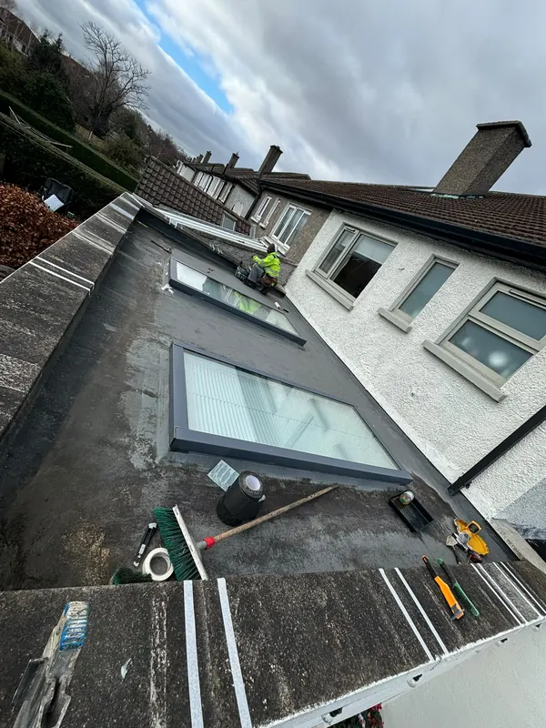 The same flat roof, before, Delta Roofing