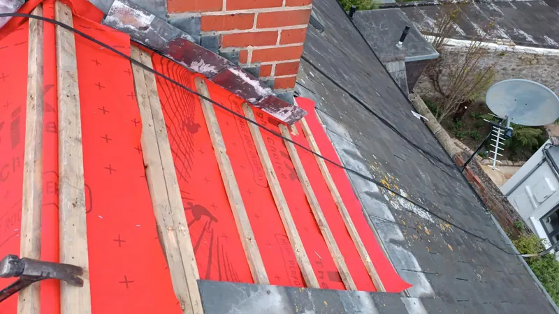 New felt dressed up to the chimney, Delta Roofing