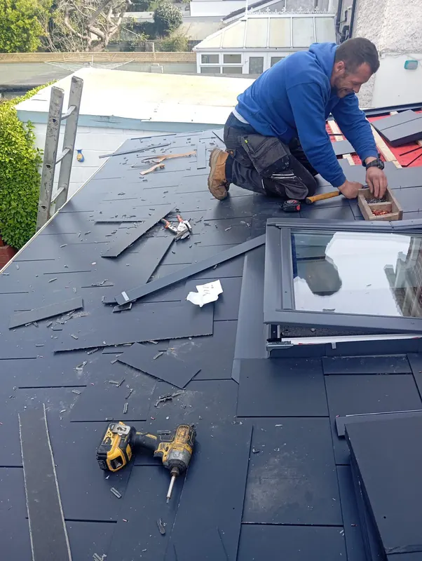 Fitting a roof window into new slate, Delta Roofing