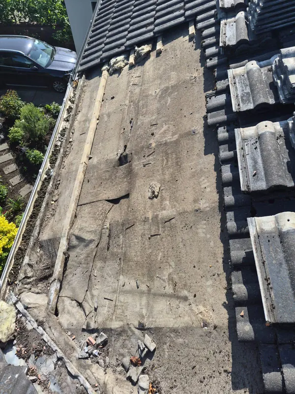Old felt off, timbers checked, Delta Roofing