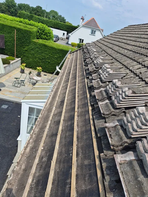 Concrete tile roof before the strip, Delta Roofing