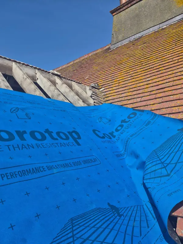 Tiles back on over new membrane, Delta Roofing
