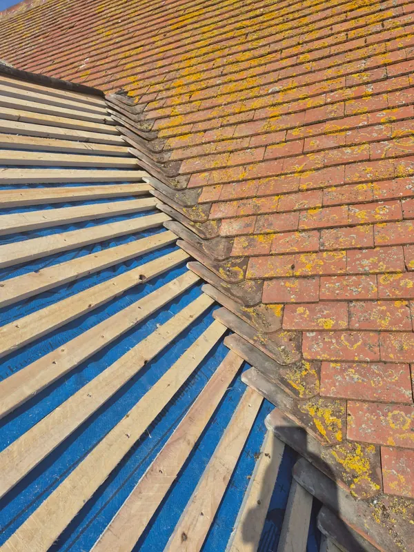 Clay tile relaid on new battens, Delta Roofing