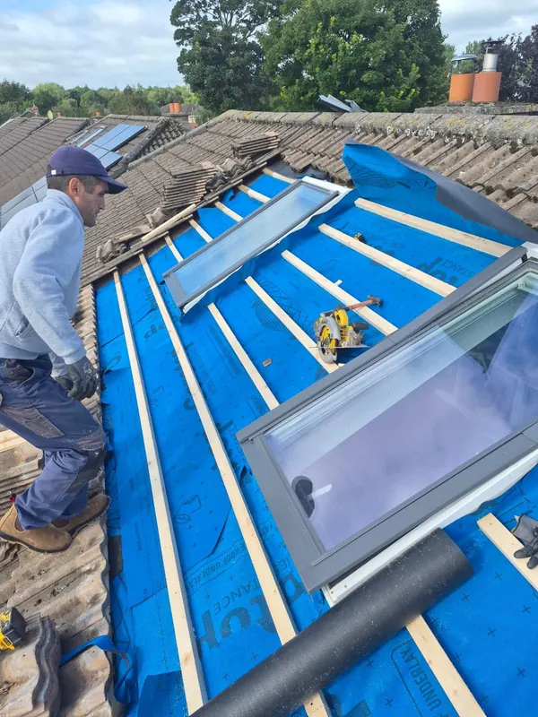 Two roof windows on breathable membrane, Delta Roofing