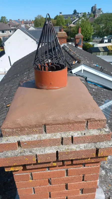 Chimney recapped and pointed, after, Delta Roofing