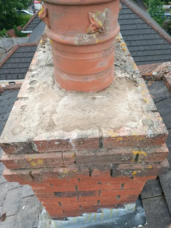 Cracked capping, before, Delta Roofing